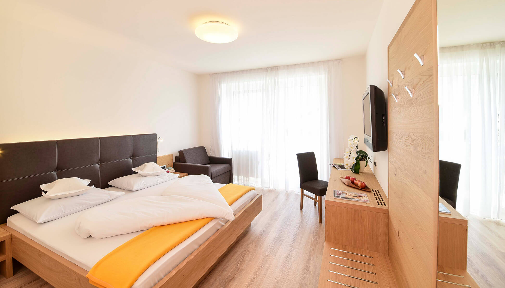 Zimmer Classic Plus Bett - Hotel Rablanderhof